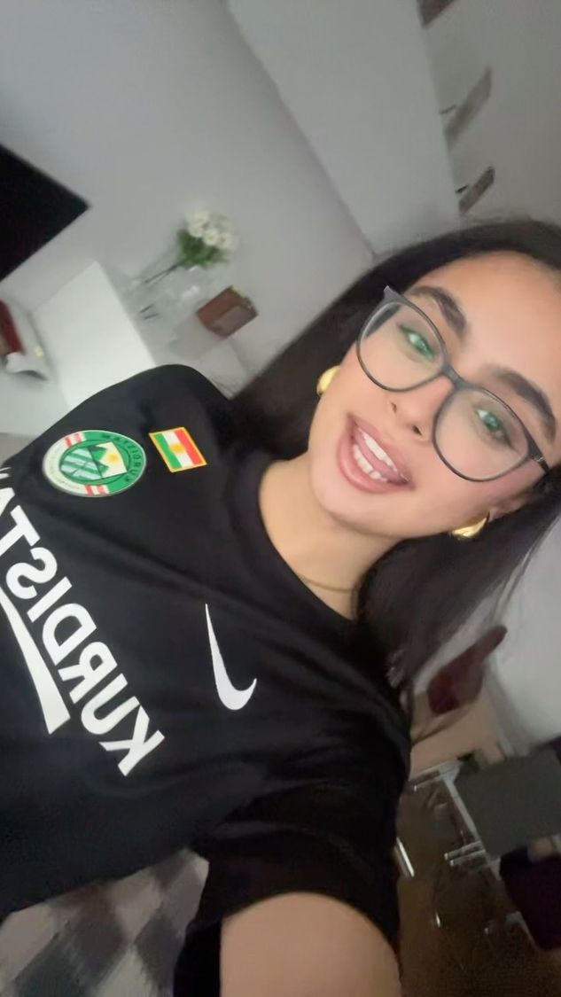 Kurdish woman in a Kurdistan shirt